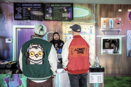 Guests wearing custom chainstitch embroidered jackets at the Doodles activation during Art Basel Miami