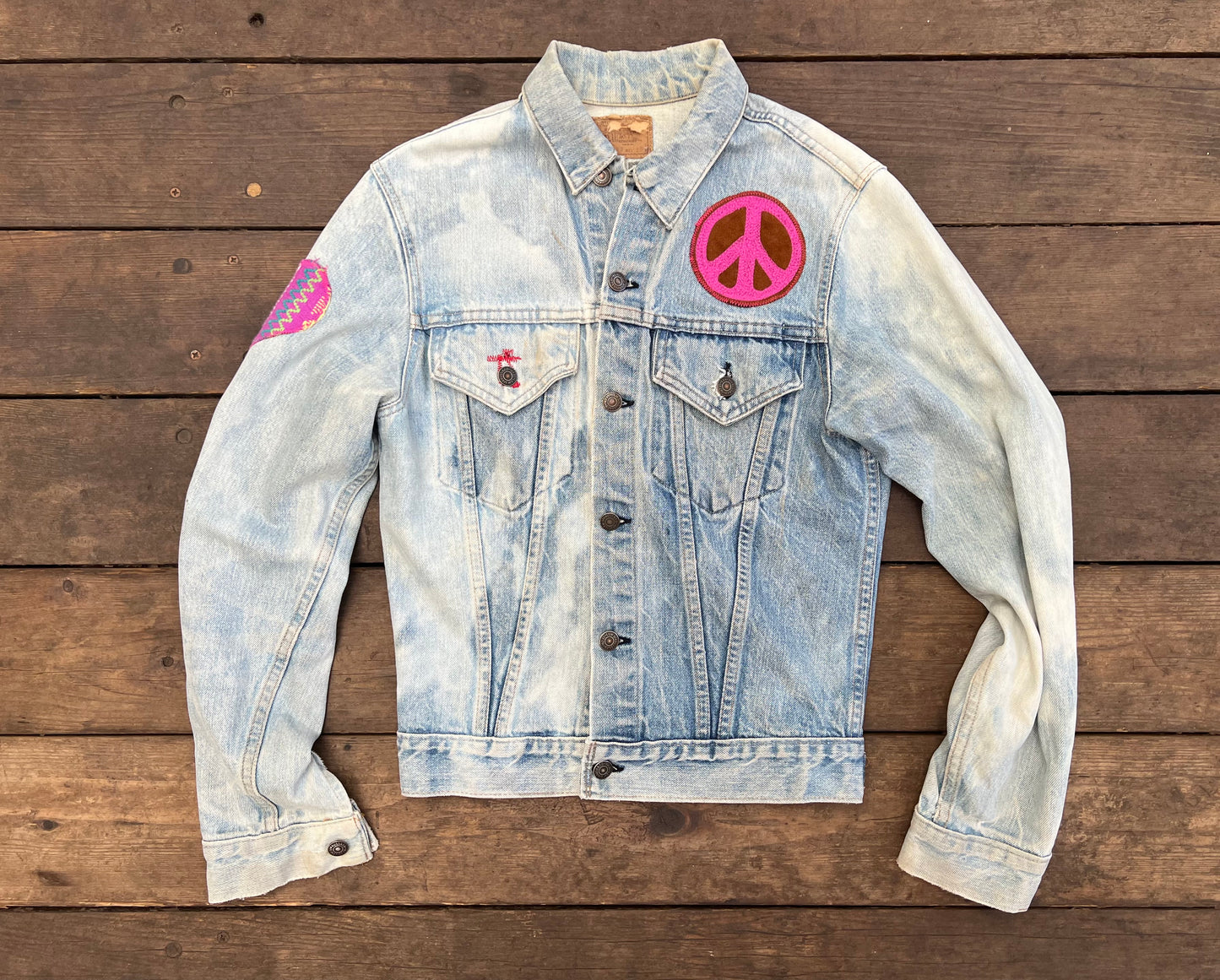 "One of a Kind" Levis Denim Jacket with Chainstitch Embroidery and Leather Stars and patches.