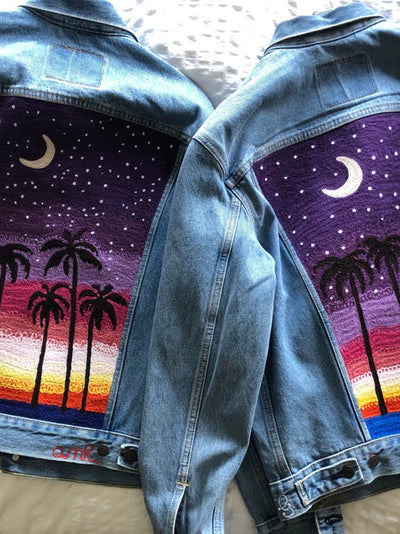 Custom chainstitch embroidered denim jackets with palm tree sunset artwork in Los Angeles