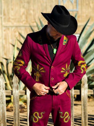 Custom chainstitch embroidered burgundy suit with Western-inspired artwork in Los Angeles