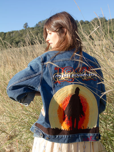 Custom Harvest Moon denim jacket with embroidered back artwork created in Los Angeles