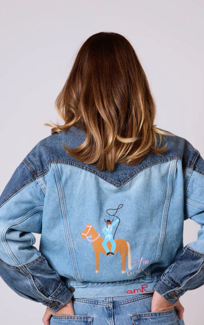 Woman wearing a custom Levi’s Trucker Jacket with Lottie Rae artwork embroidered in chainstitch by amR