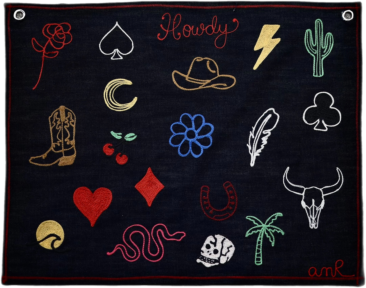 Live event chainstitch embroidery design menu by AMR, displaying colorful on-site embroidery options including cowboy boots, hats, cacti, flowers, cherries, a snake, hearts and western-inspired motifs for guests to choose from