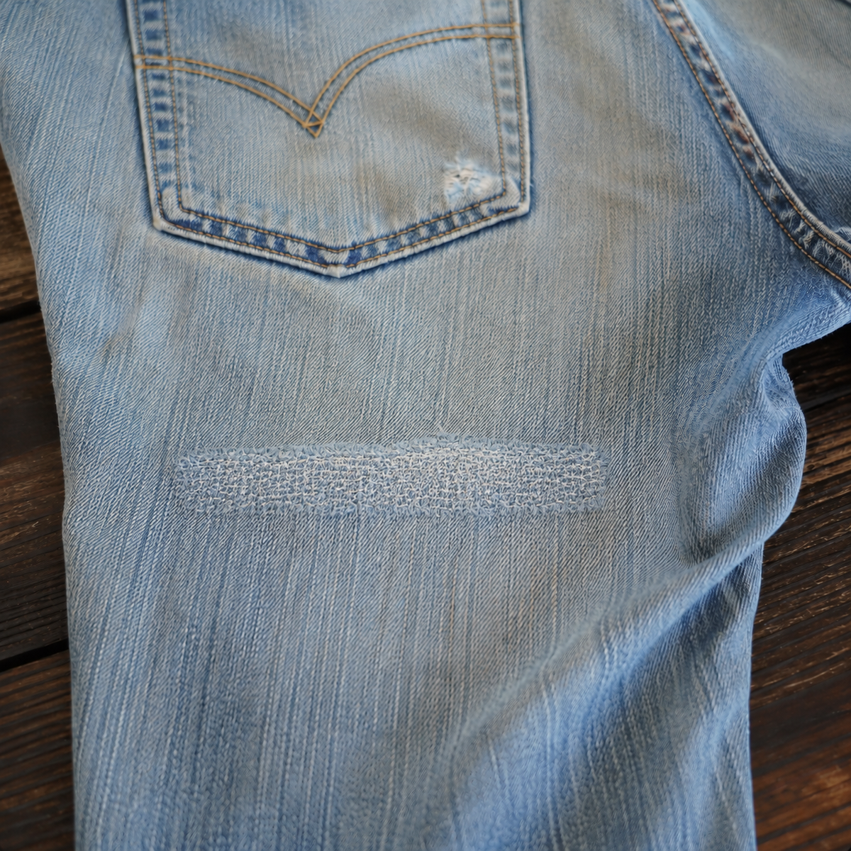The same vintage jeans reinforced with darning after denim repair in Marina del Rey, CA