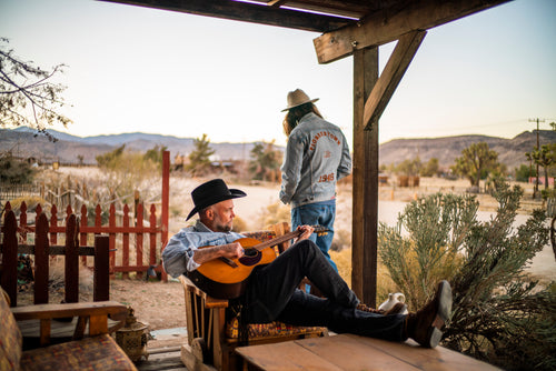 Custom Pioneertown garments with western embroidery photographed during a desert shoot